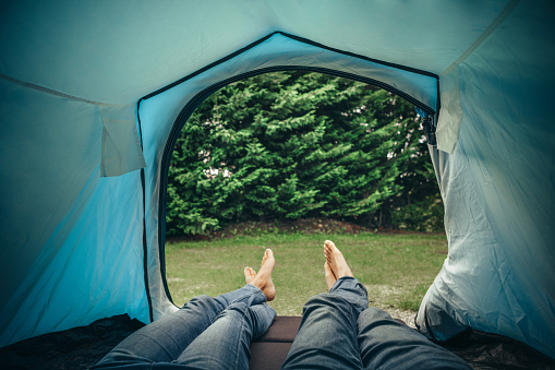 Couple lying in tent