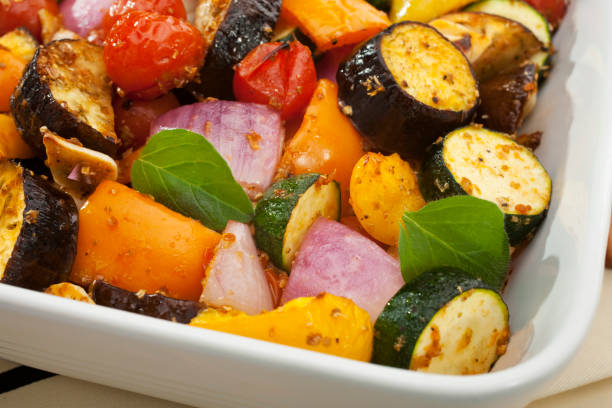 Roast Mediterranean Vegetables Roast mediterranean vegetables, or ratatouille, baked in the oven. ratatouille stock pictures, royalty-free photos & images