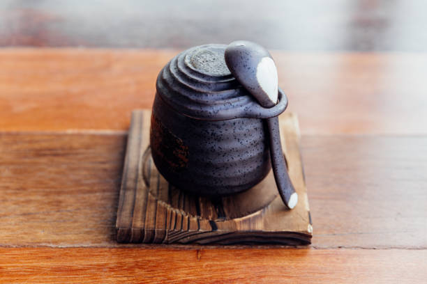 istock Japanese Caramel Pudding served in black ceramic cup. 1058254274
