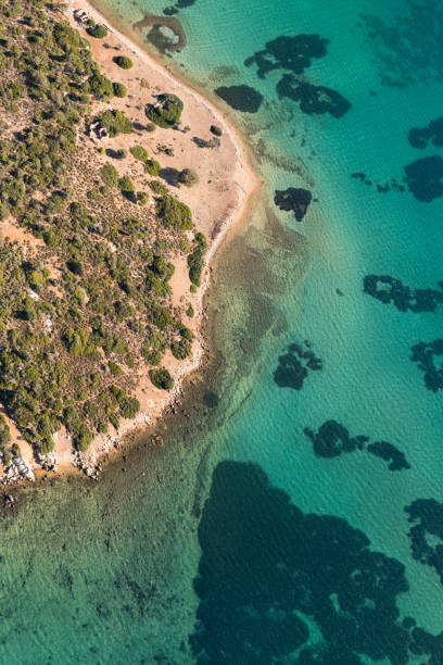istock Little island air view. 1058254294