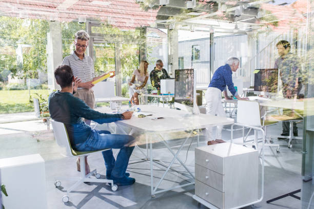istock Large group of business people working in a modern office. 1058257866