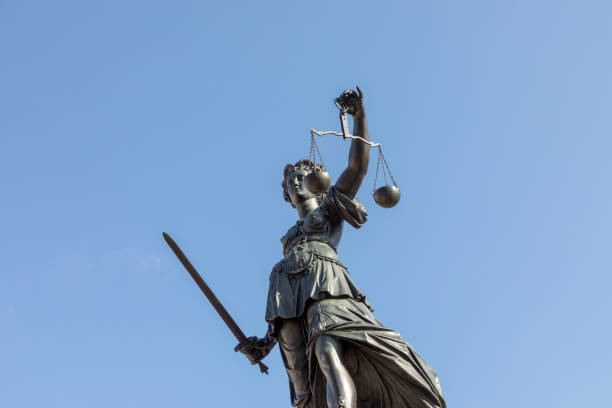 istock fountain with lady justice in Frankfurt 1058258620