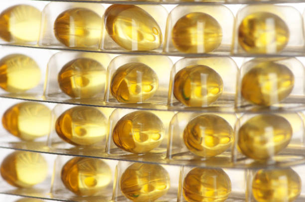 istock Capsules of cod liver oil in blisters 1058263302