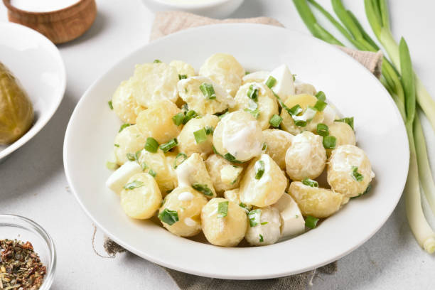 istock Potato salad with eggs and green onion 1058267478