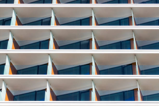 istock Rows of balconies in modern white apartment building 1058268652