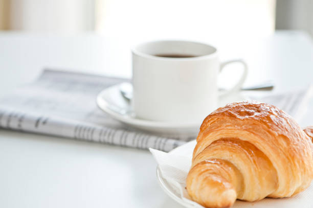 croissant and coffee stock photo