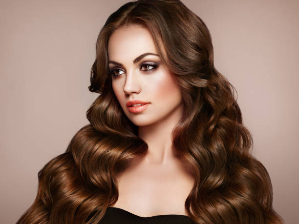 istock Brunette woman with curly hair 1058273890