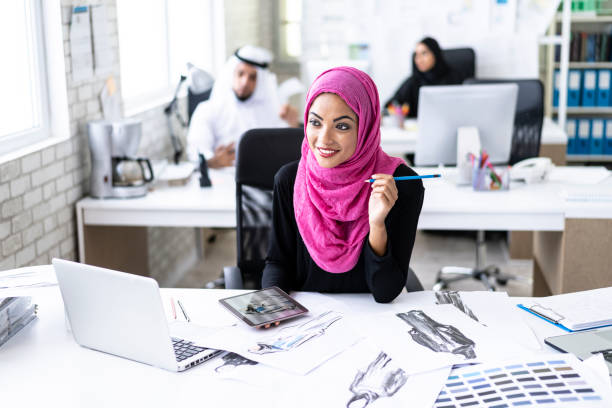 istock Female designer in fashion studio 1058274404