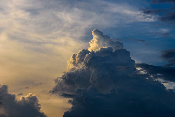 istock Cloudy sky group with condensation in evening before sunset and raining. 1058276056
