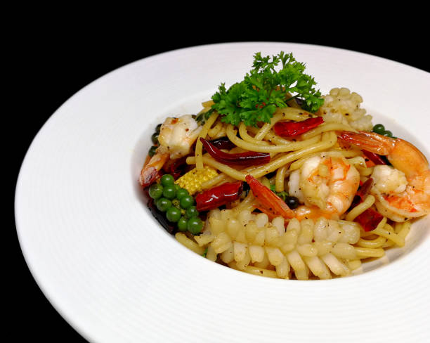 istock Spaghetti seafood with spicy chili Seafood Thai Style (Spaghetti Pad Kee Mao) 1058290804
