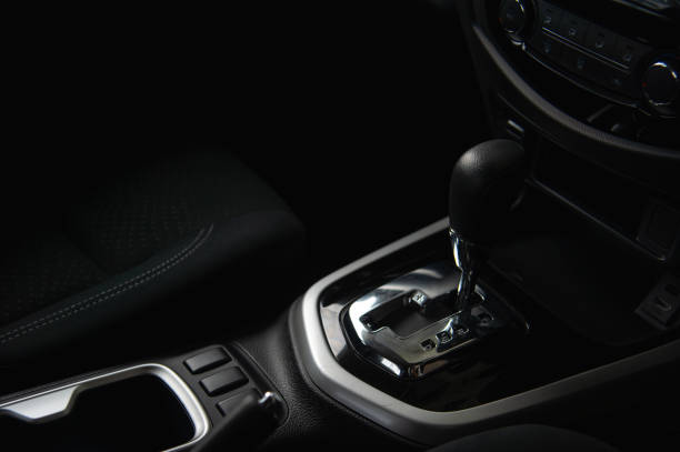 istock closeup automatic gear in new car with soft-focus and over light in the background 1058290966
