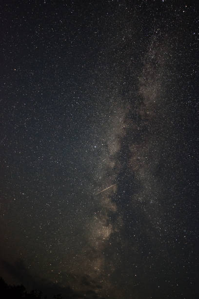 istock Clouds in the moonlight against the milky way summer night 1058291686