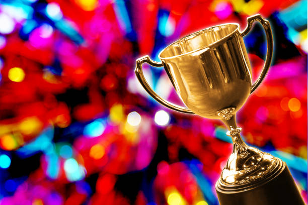 istock Trophy with abstract red theme party background 1058301936