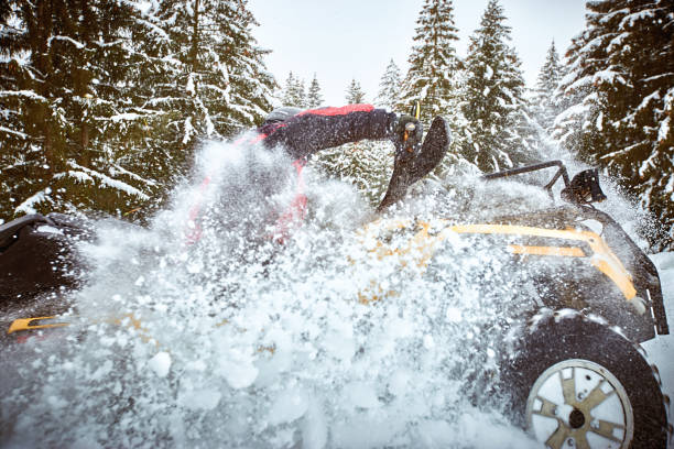 istock Winter race on an ATV on snow in the forest. 1058302050