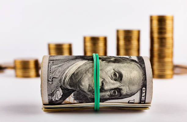 istock 100 bills, exchange, currency transactions, revenue growth, gold coins 1058306104