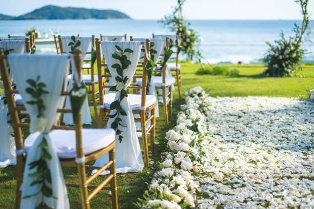 istock Chair decorated with flowers in Wedding ceremony. 1058309020