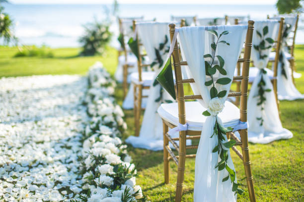 istock Chair decorated with flowers in Wedding ceremony. 1058309128