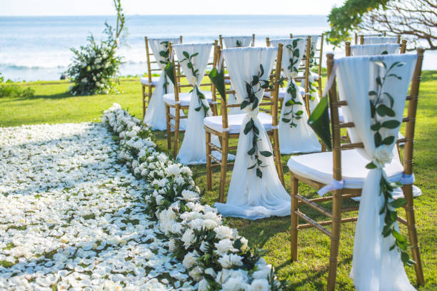 istock Chair decorated with flowers in Wedding ceremony. 1058309172