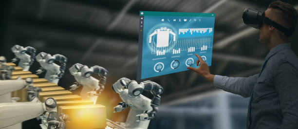 istock iot industry 4.0 concept,industrial engineer using smart glasses with augmented mixed with virtual reality technology to monitoring machine in real time.Smart factory use Automation robot arm 1058309870