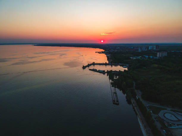 istock Sunset over the city and the river from a height 1058313500