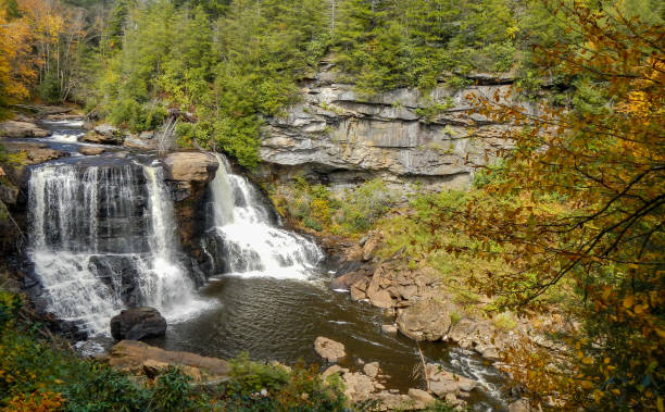 istock Waterfall Nature Scene in Autumn 1058322284