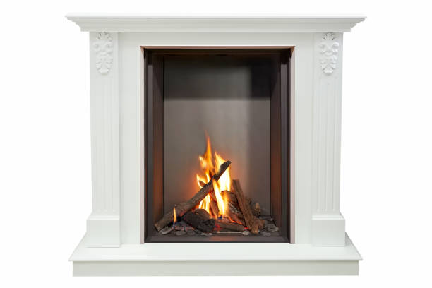 istock Burning classic fireplace of white marble. Isolated on white 1058322806