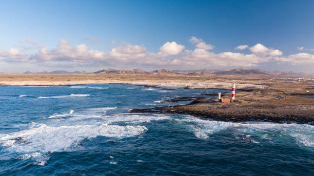 istock aerial view of lighthouse at sunset 1058322850