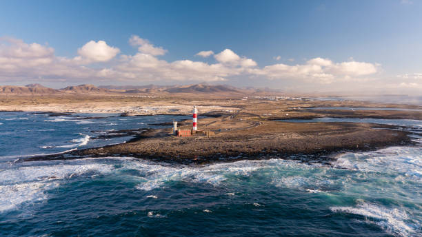 istock aerial view of lighthouse at sunset 1058322876