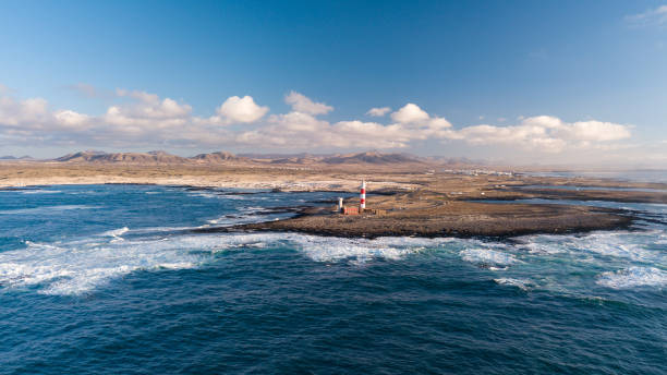 istock aerial view of lighthouse at sunset 1058322878