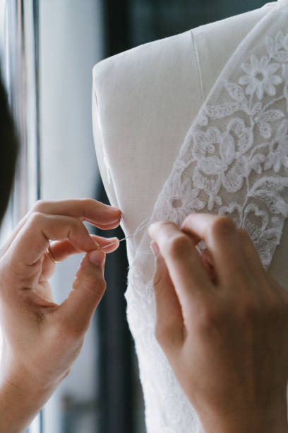 istock Fashion designer creating gowns 1058323234