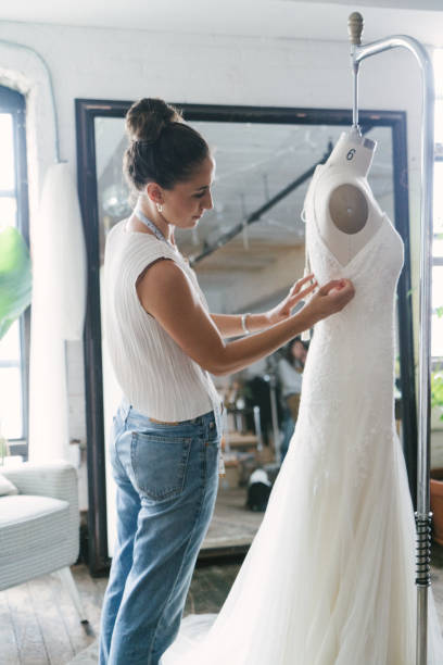 istock Fashion designer creating gowns 1058323522