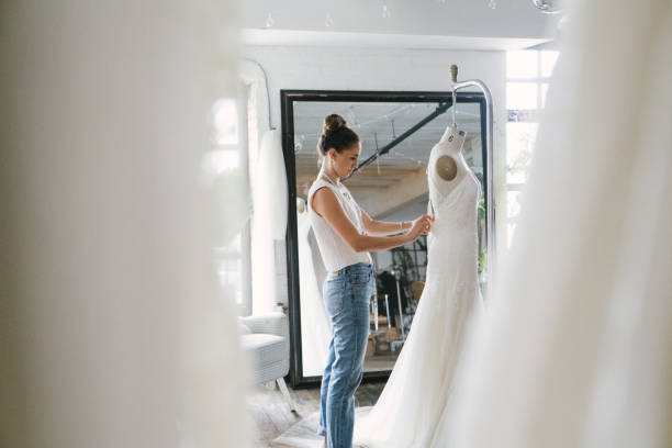 istock Fashion designer creating gowns 1058325262