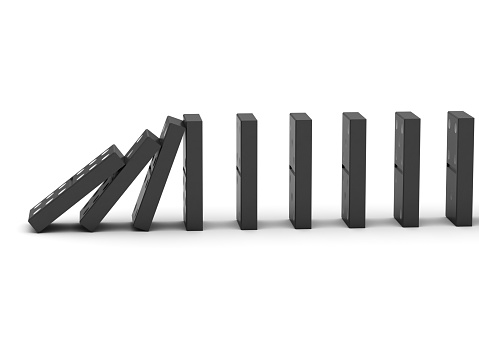 3D image of isolated domino in row.