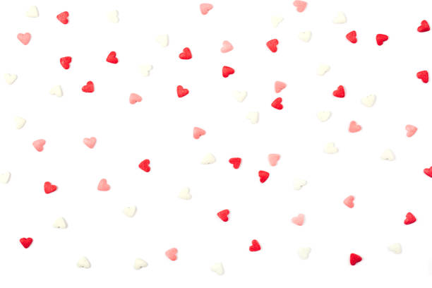 istock Heart shaped confetti isolated on the white background. 1058333626