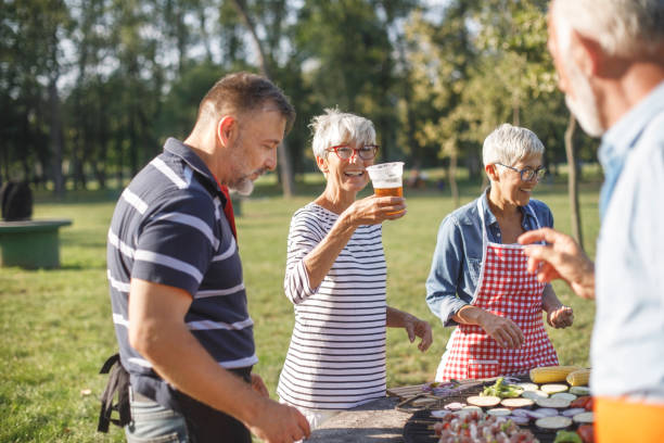 istock Senior people having a picnic 1058335446