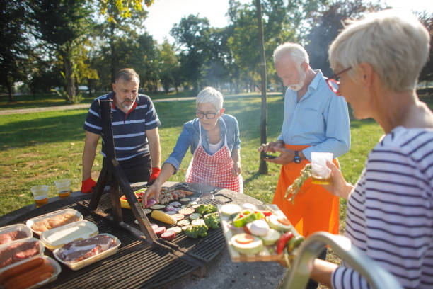 istock Senior people having a picnic 1058335750