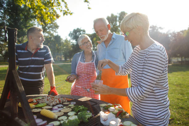 istock Senior people having a picnic 1058335892