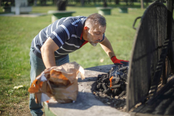 istock Senior man preparing a barbecue 1058337154