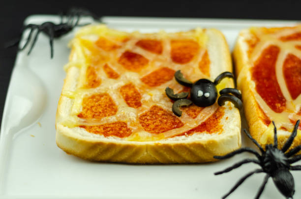 istock Funny sandwiches with  spider and  spider web for Halloween party 1058339186