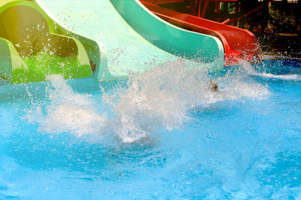 istock Baby spray in the summer water pool 1058343764