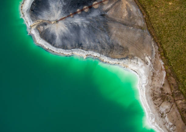 istock Azure lake top view, abstract fantasy green and brown pattern background 1058343834