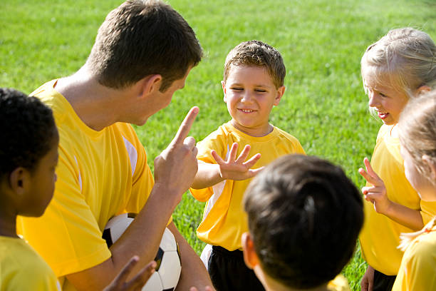 istock Coach coaching diverse young team of soccer players 105834871