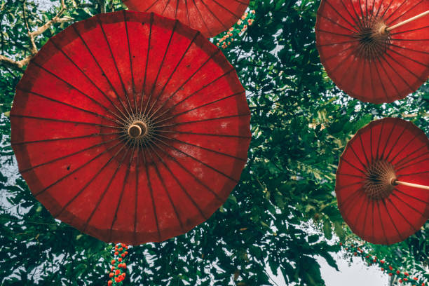 istock Red umbrella in Northern thai style in decoration 1058352014