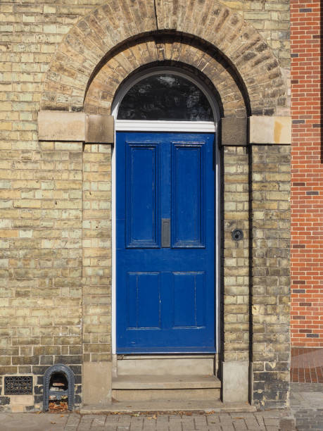 istock blue traditional british door 1058354588
