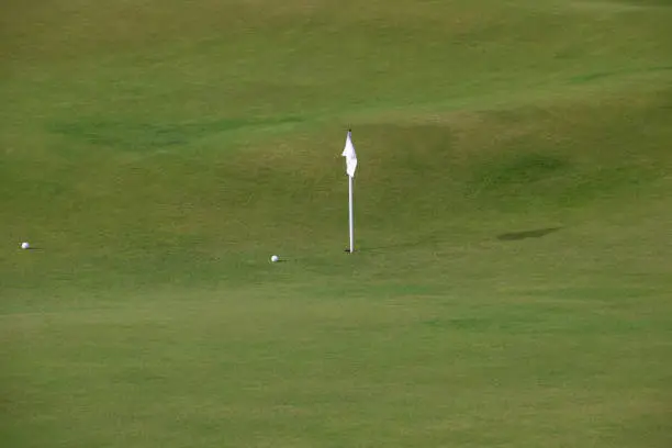 Golf marker flag at St.Andrews golf course Scotland