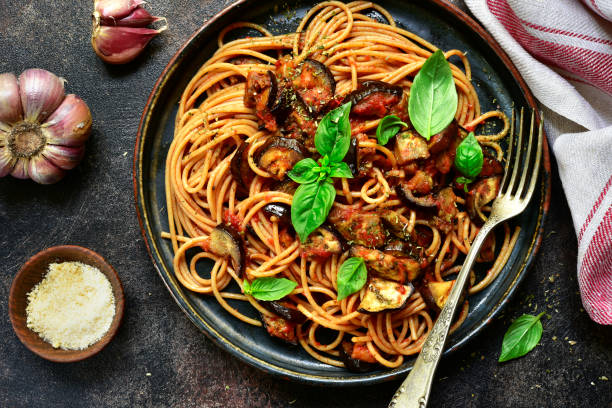 istock Spaghetti alla norma - traditional Italian pasta 1058358114