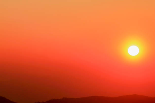 istock Orange light of sunset The mountain is obscured. 1058359900