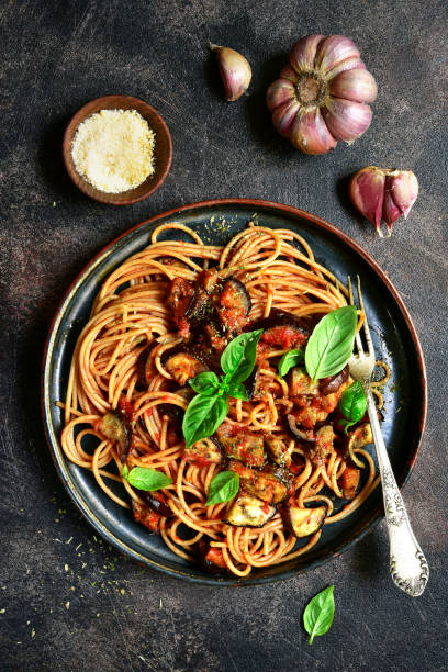 istock Spaghetti alla norma - traditional Italian pasta 1058363964