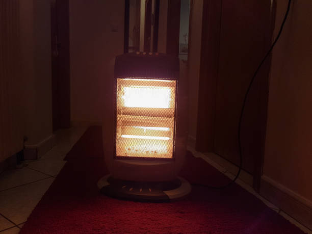 istock heater electric on the room carpet winter 1058366218