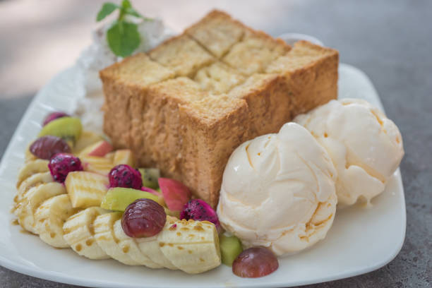 istock Mixed fruit and Honey toast with Ice cream 1058367916